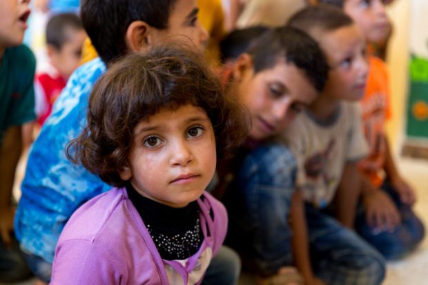 Merciless onslaughts and formidable challenges fail to wipe off the hope in this young refugee's eyes (World Vision)